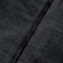 Load image into Gallery viewer, Close up of the flat locked seams of a Sensory Friendly Clothing garment.

